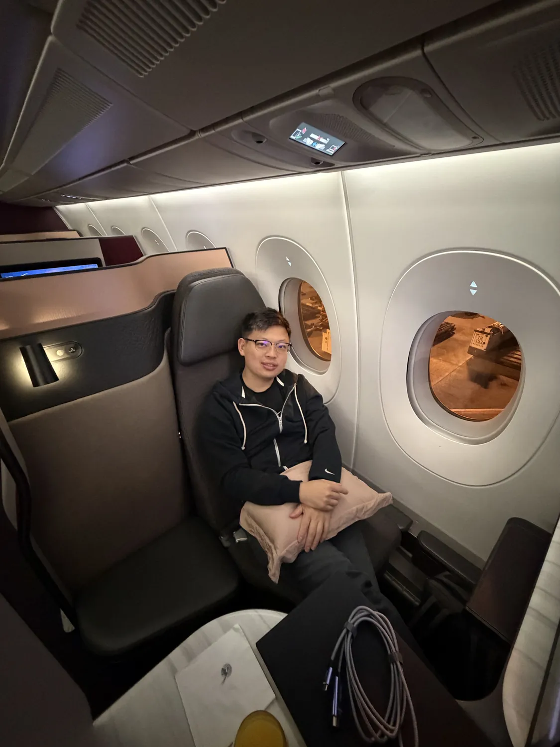 Dr Sin Yong in the cabin on the flight from Singapore to Brazil