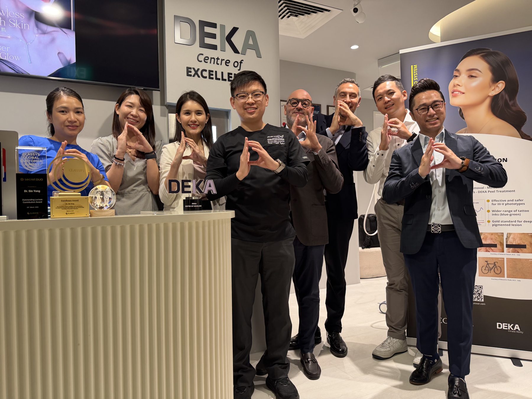 The IN Eternity Clinic team and DEKA delegation with the Centre of Excellence designation at the clinic reception